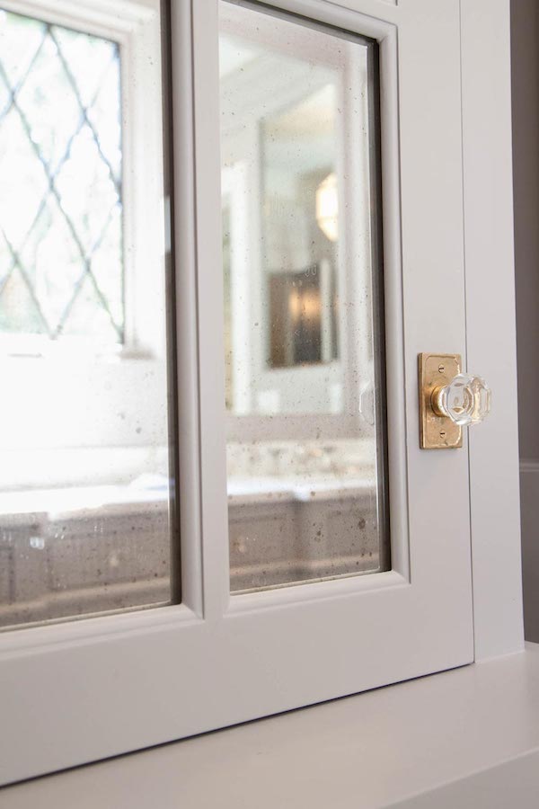 brookhaven tudor master bath custom cabinetry mirror detail