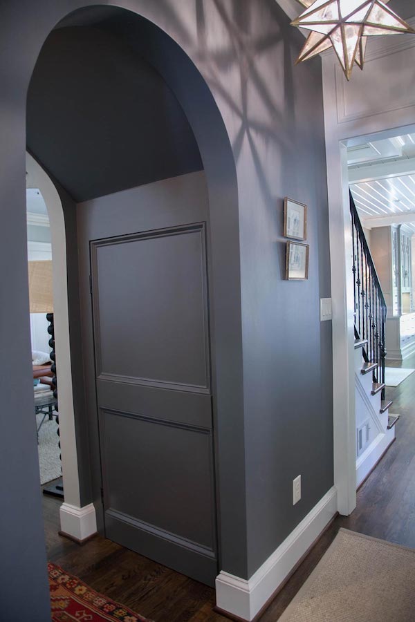 brookhaven tudor hidden door seamlessly hides entry to the basement