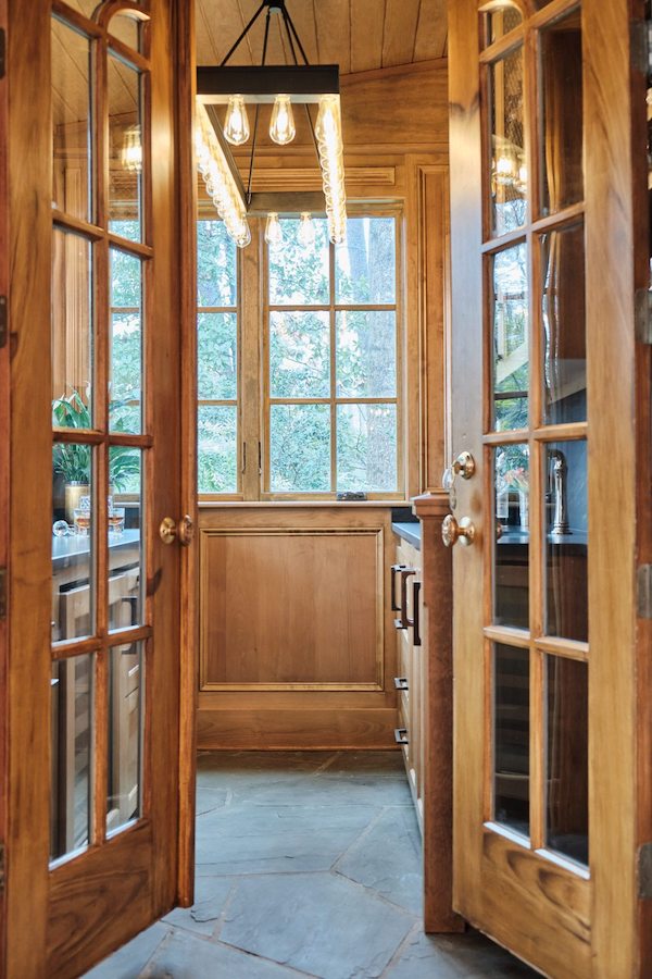 buckhead bar exterior shot of french doors opening into converted sun room bar