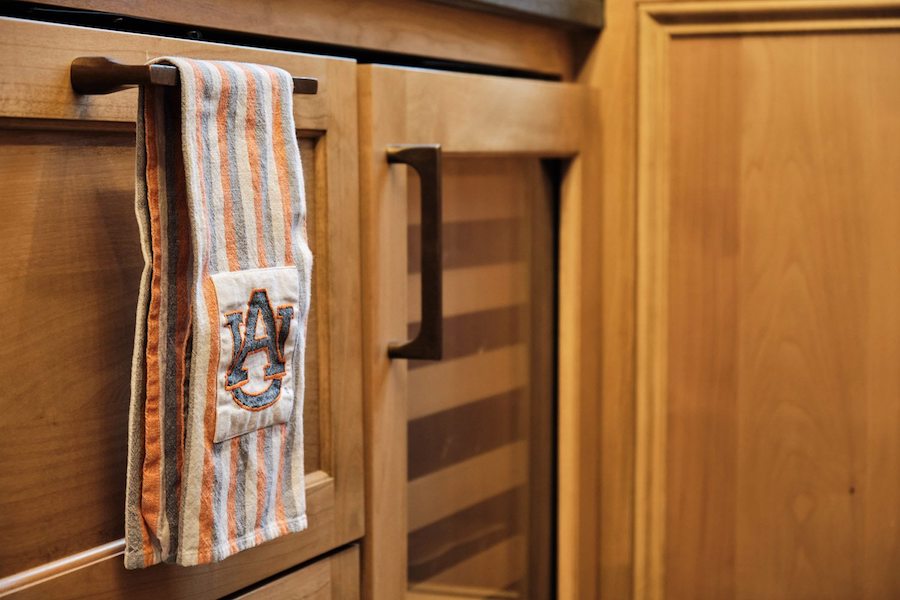 buckhead bar iron hardware and wood detail on lower bar cabinets