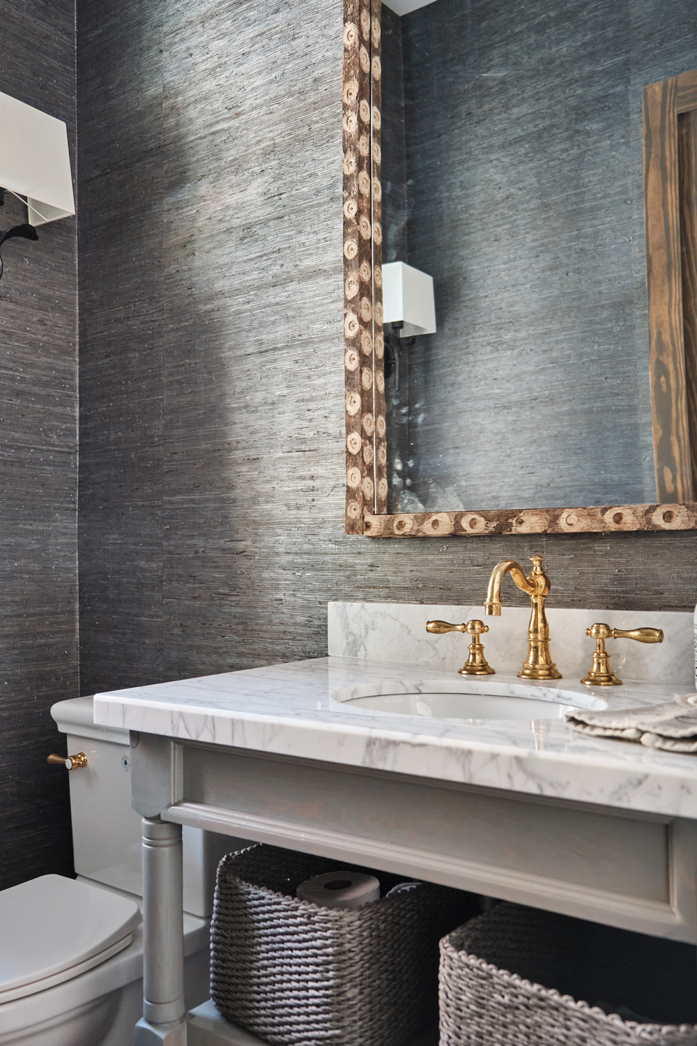 textured wallpaper in the main floor bathroom