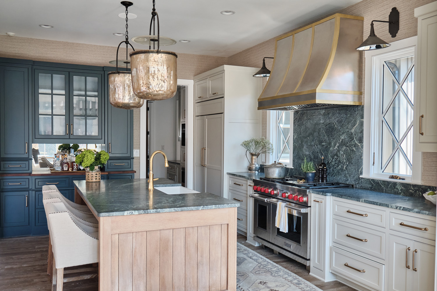a wide view of the kitchen looking into the pantry area