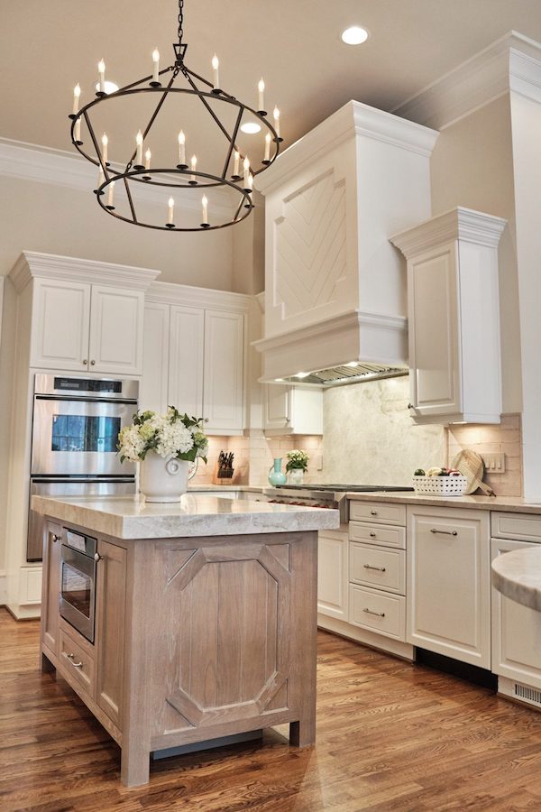 river retreat kitchen island, range, and cabinets